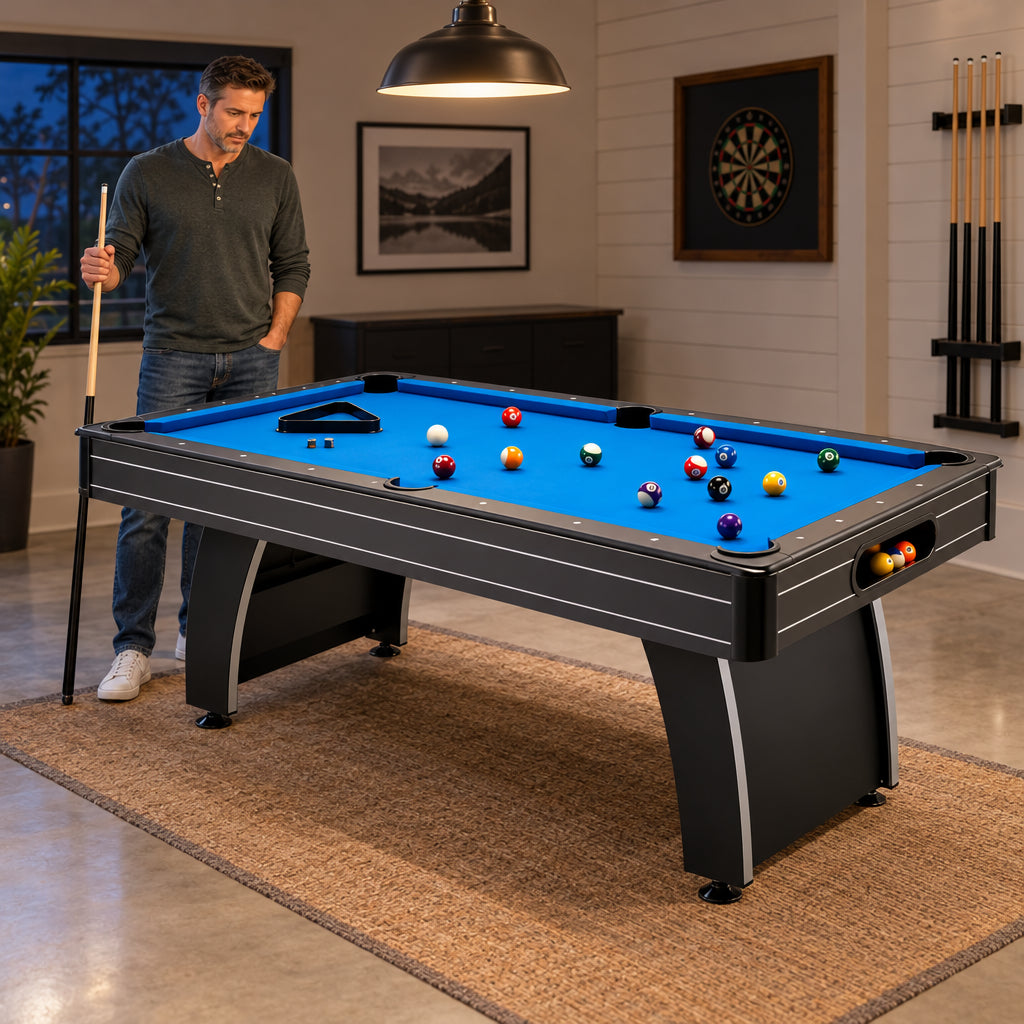 Pool Table Built, a man standing at the end of the table holding a cue upright at his side