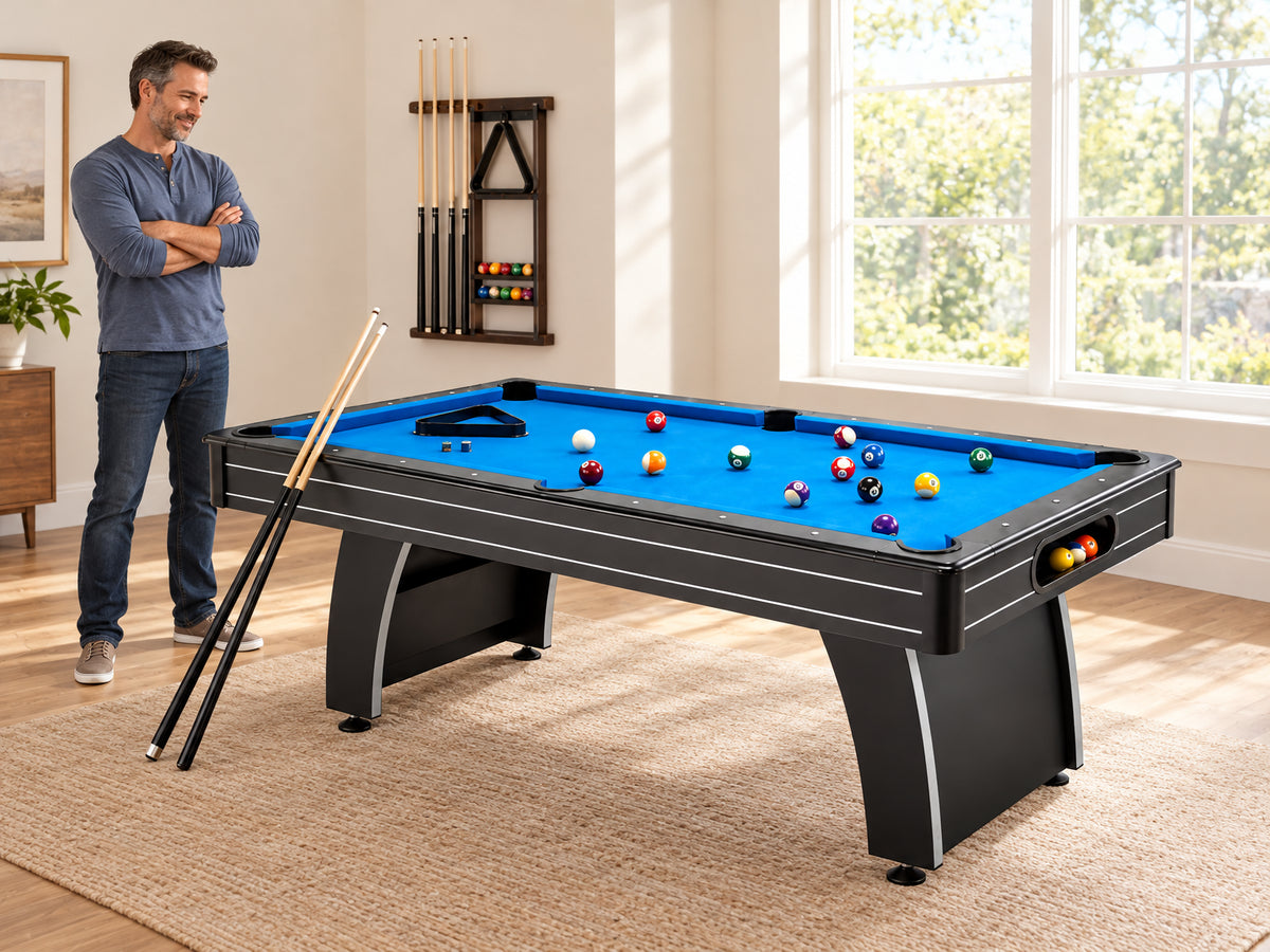 Pool Table Built, a man standing back with arms loosely crossed