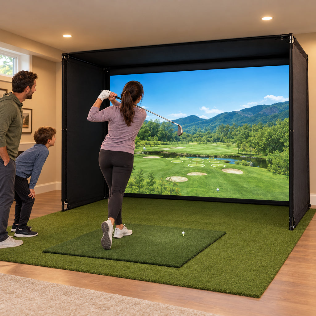 Golf Simulator Enclosure Built for, adult woman swinging while a man and a child of about 10 watch from the side