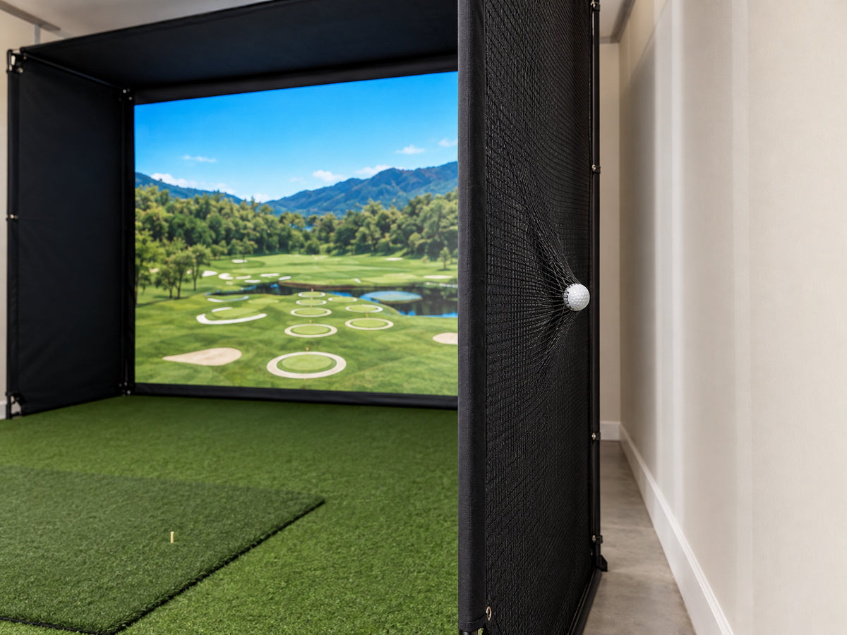 Golf Simulator Enclosure Built for, golf ball pressing into the taut side netting panel, netting bowing slightly inward
